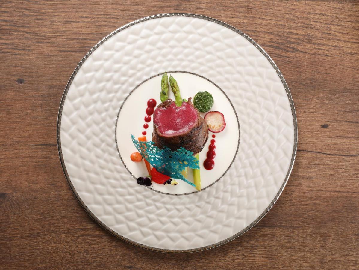 Peridot Grand Luxury Boutique Hotel Ханой Экстерьер фото A plate of food